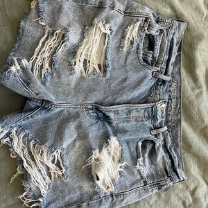 Brand new never worn American Eagle medium- light washed ripped jean shorts :)